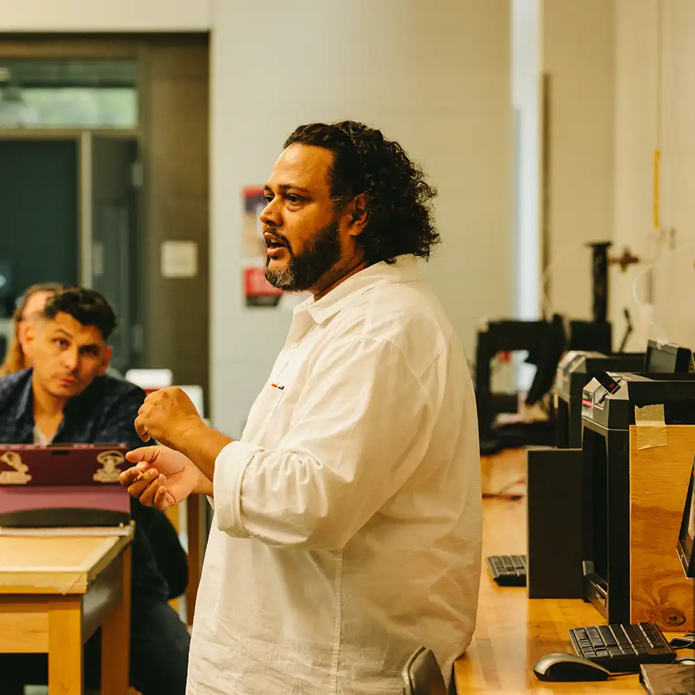 Teacher Working with students in a lab