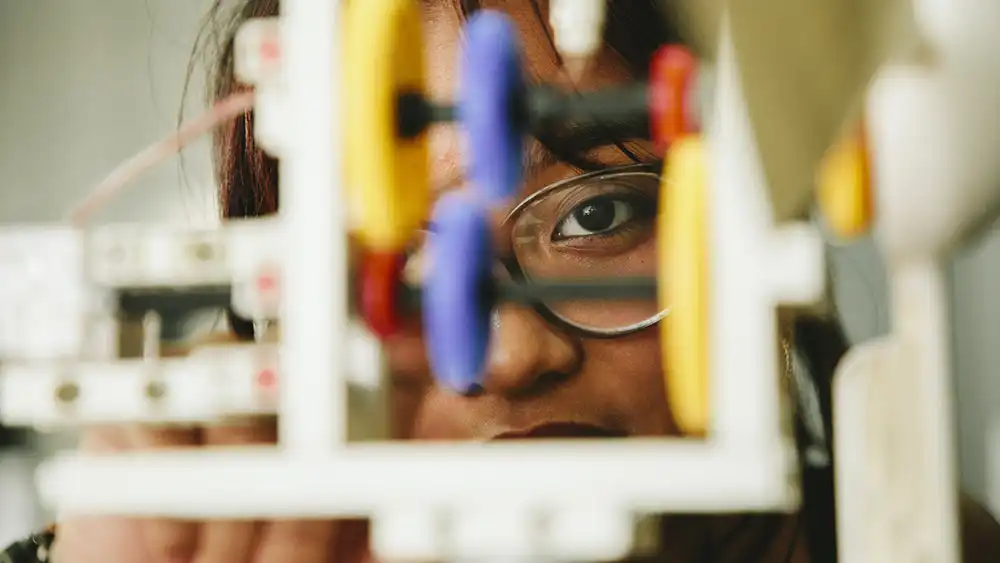 Man in suit talking to another man