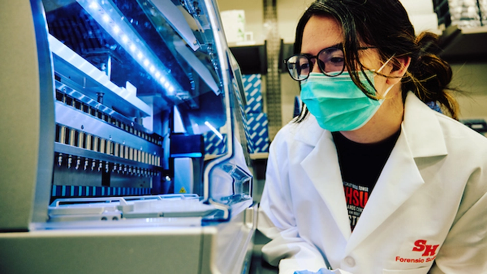Man in suit talking to another man