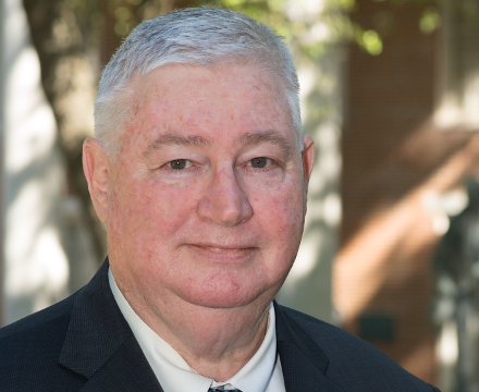 Dr. Charles Henley