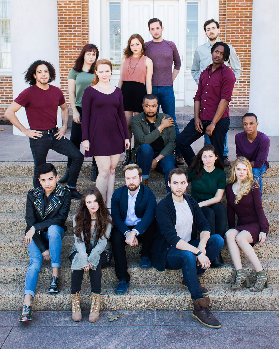 Group photo of the 2018 senior showcase students on the steps of Austin Hall.