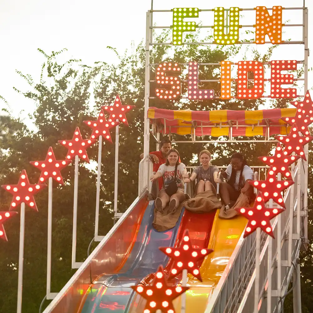 Student Leaders on the Fun Slide at the Sam Jam Carnival.