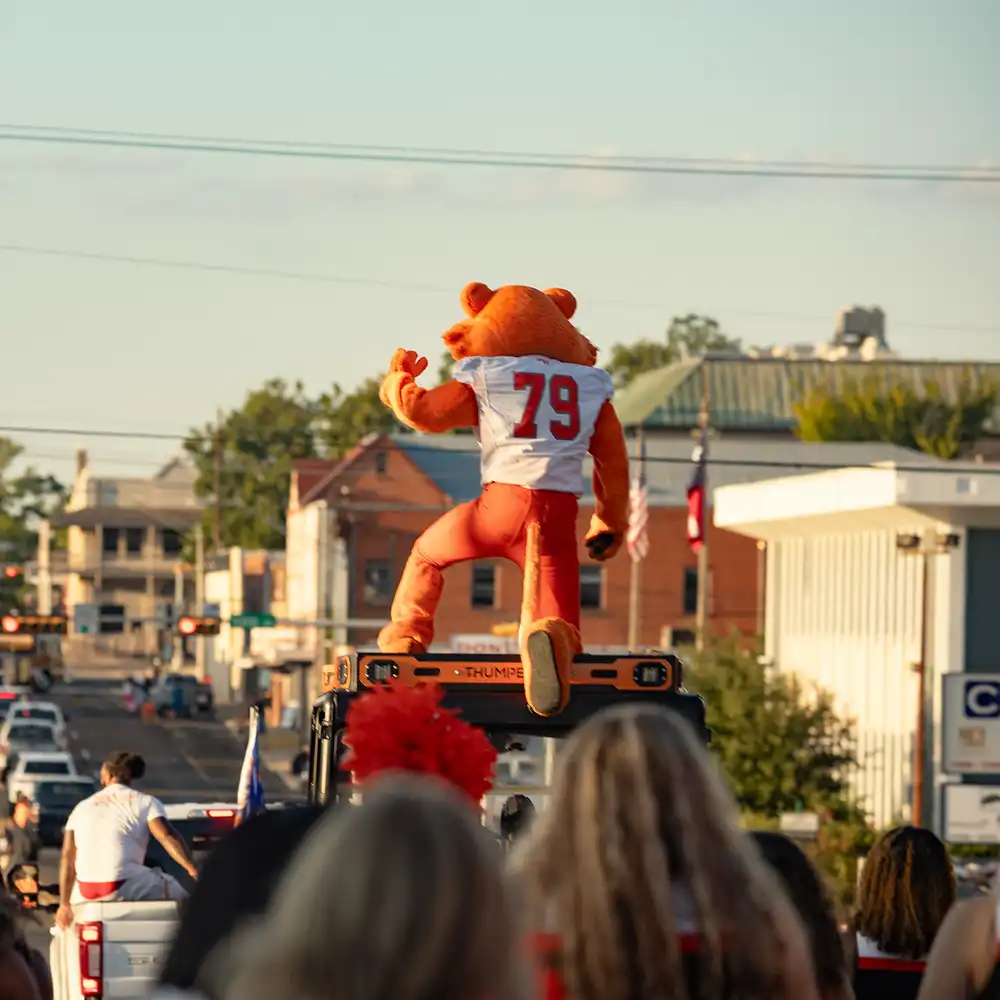 Sammy on his float during the Homecoming Parade watched by thousands of participants