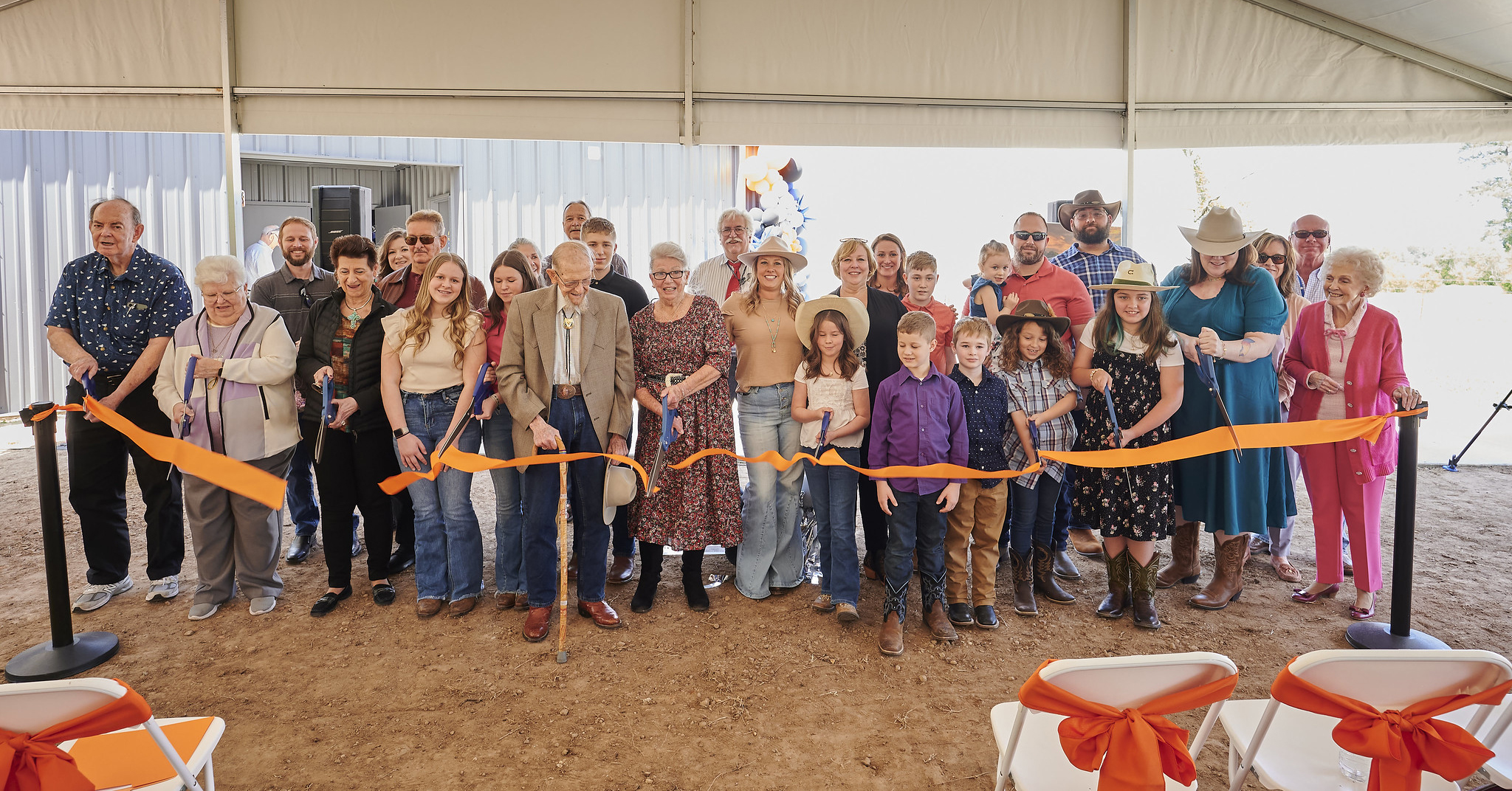 Family and friends joined Barbara Dominey in cutting the ribbon on the Dominey Observatory.