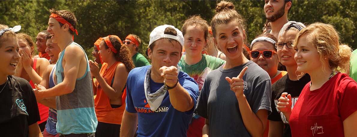 Campers pointing towards the camera