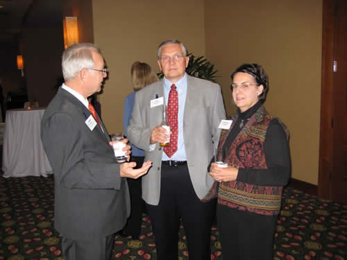 Dr. David Payne visits with John and Frances Planchard