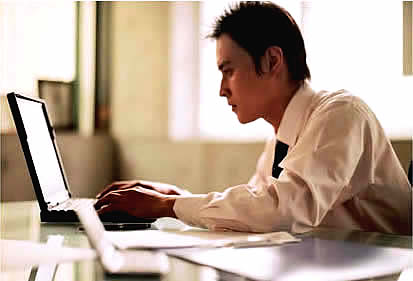 man working on a computer