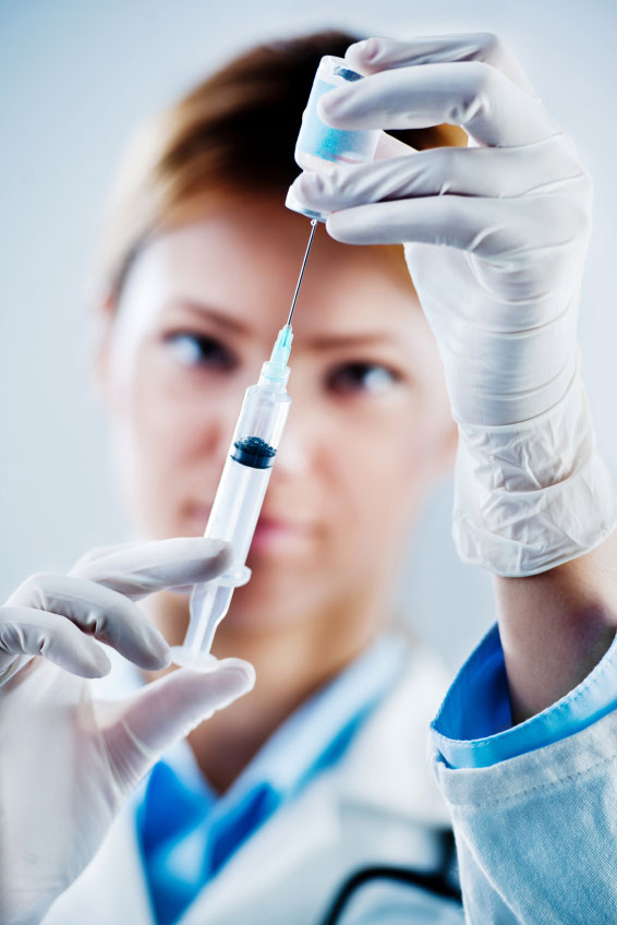 nurse prepping flu shot