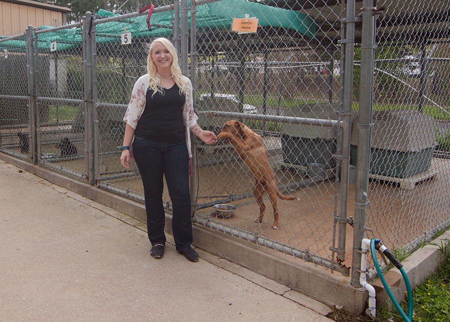 Ashley and a dog at Rita B. Huff