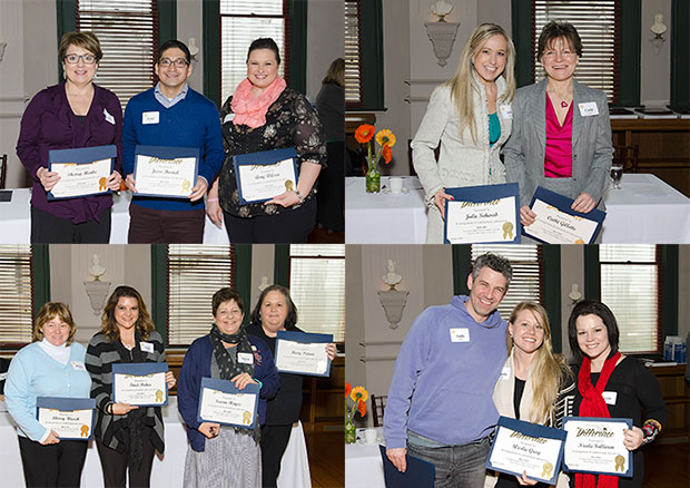 various faculty and staff members posing with their contribution certificates