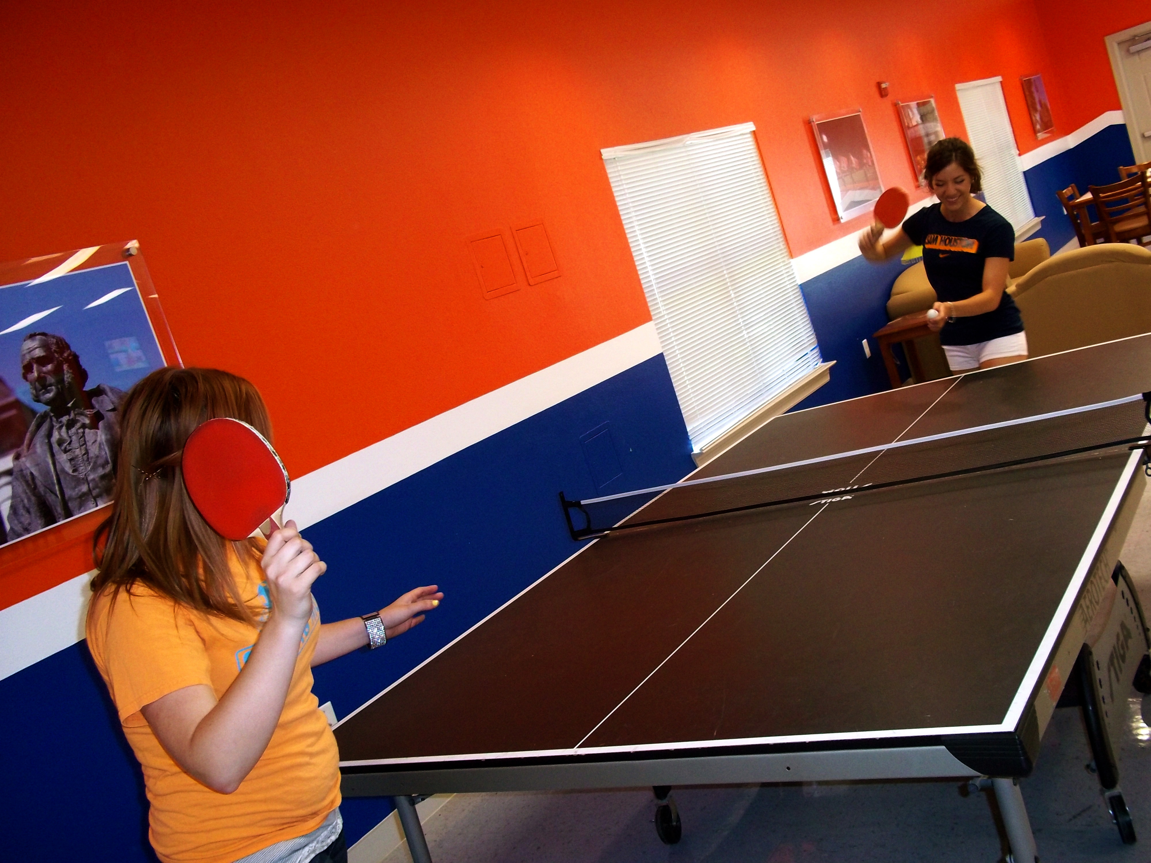 Girls playing ping pong