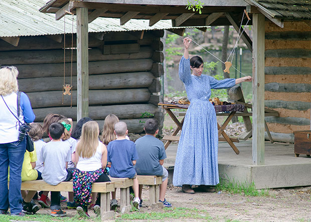 Museum interpreter with kids