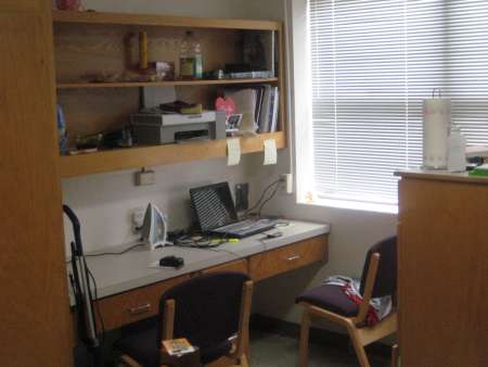 Dorm room desk and shelving