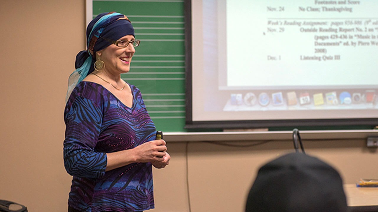 a woman teaching a class