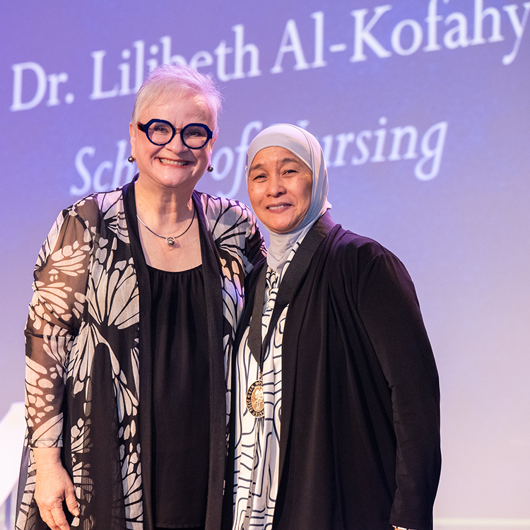 Lilibeth Al-Kofahy with University President Alisa White
