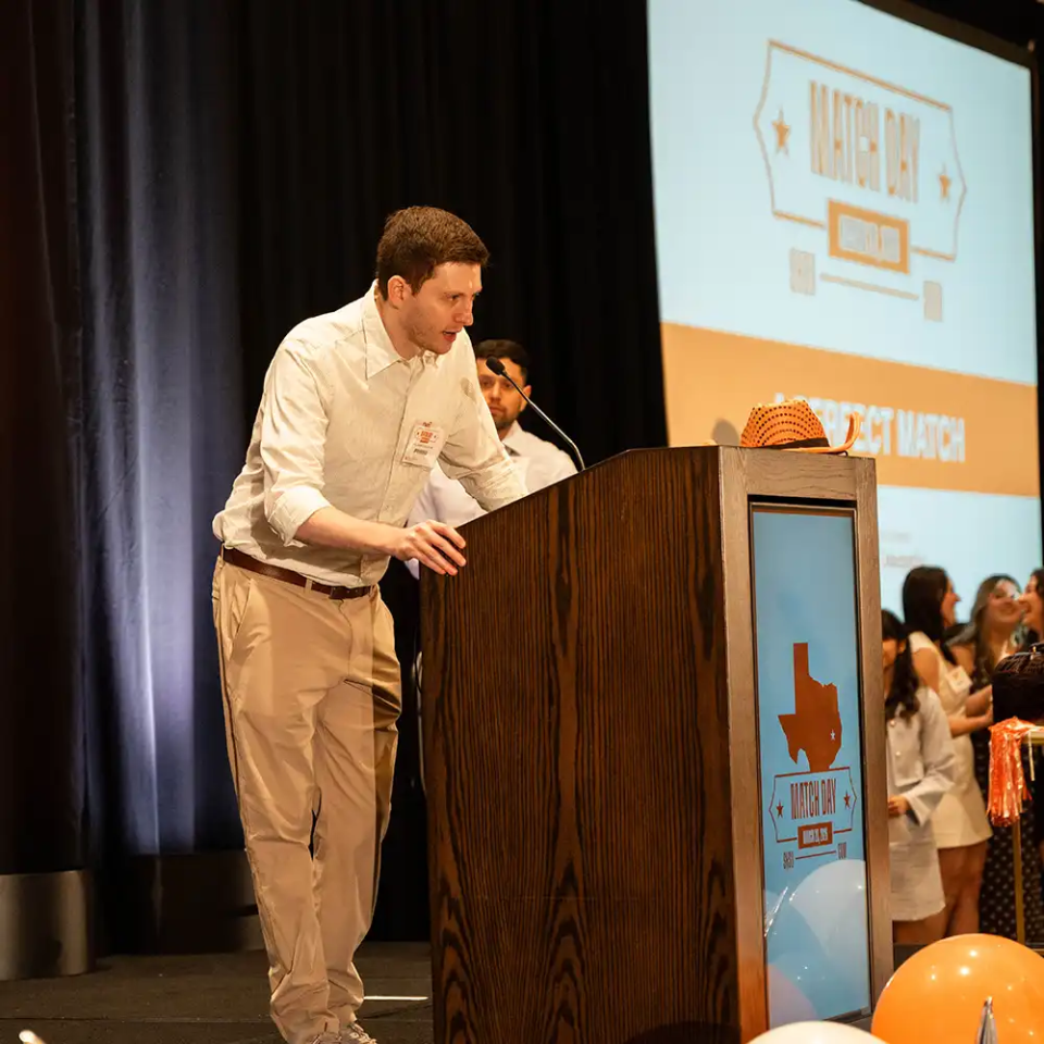 A student doctor announces where they matched for their residency.