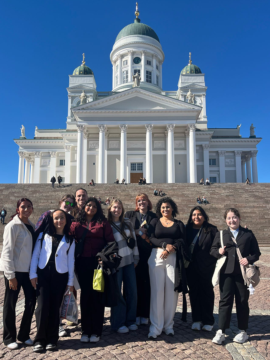 SHSU-COCJ students stand outside a Finnish government building.