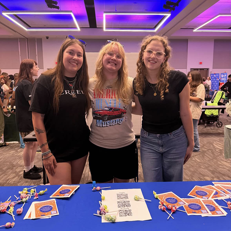 CommuniKats Org leaders at an org fair