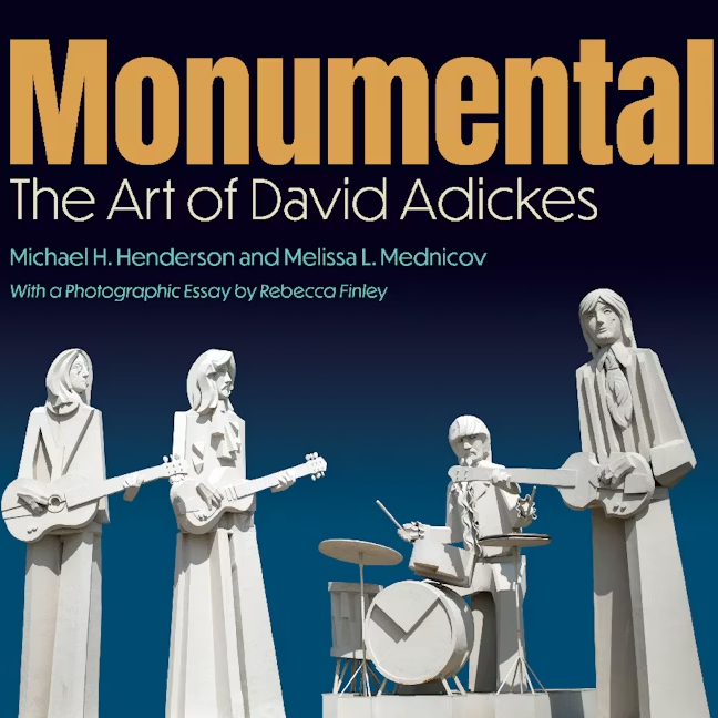 The cover of the book, Monumental