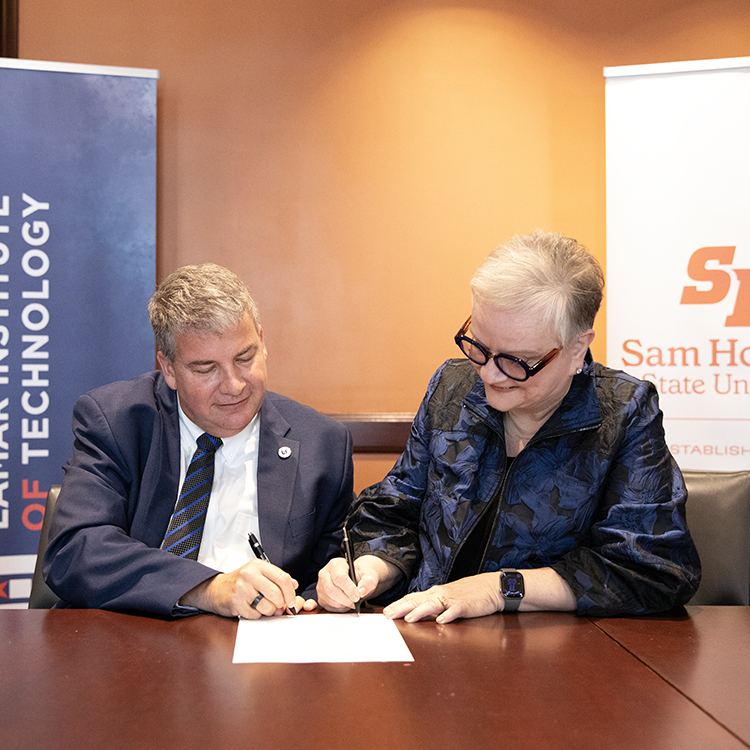 LIT President Sydney Valentine and SHSU President Alisa White sign an MOU establishing the Bearkat Connect program