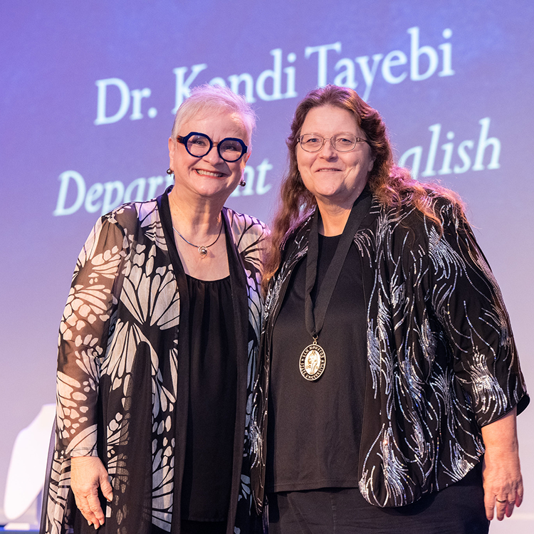 Kandi Tayebi with University President Alisa White