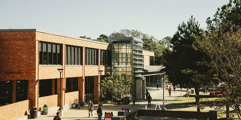Students walking near the LSC building