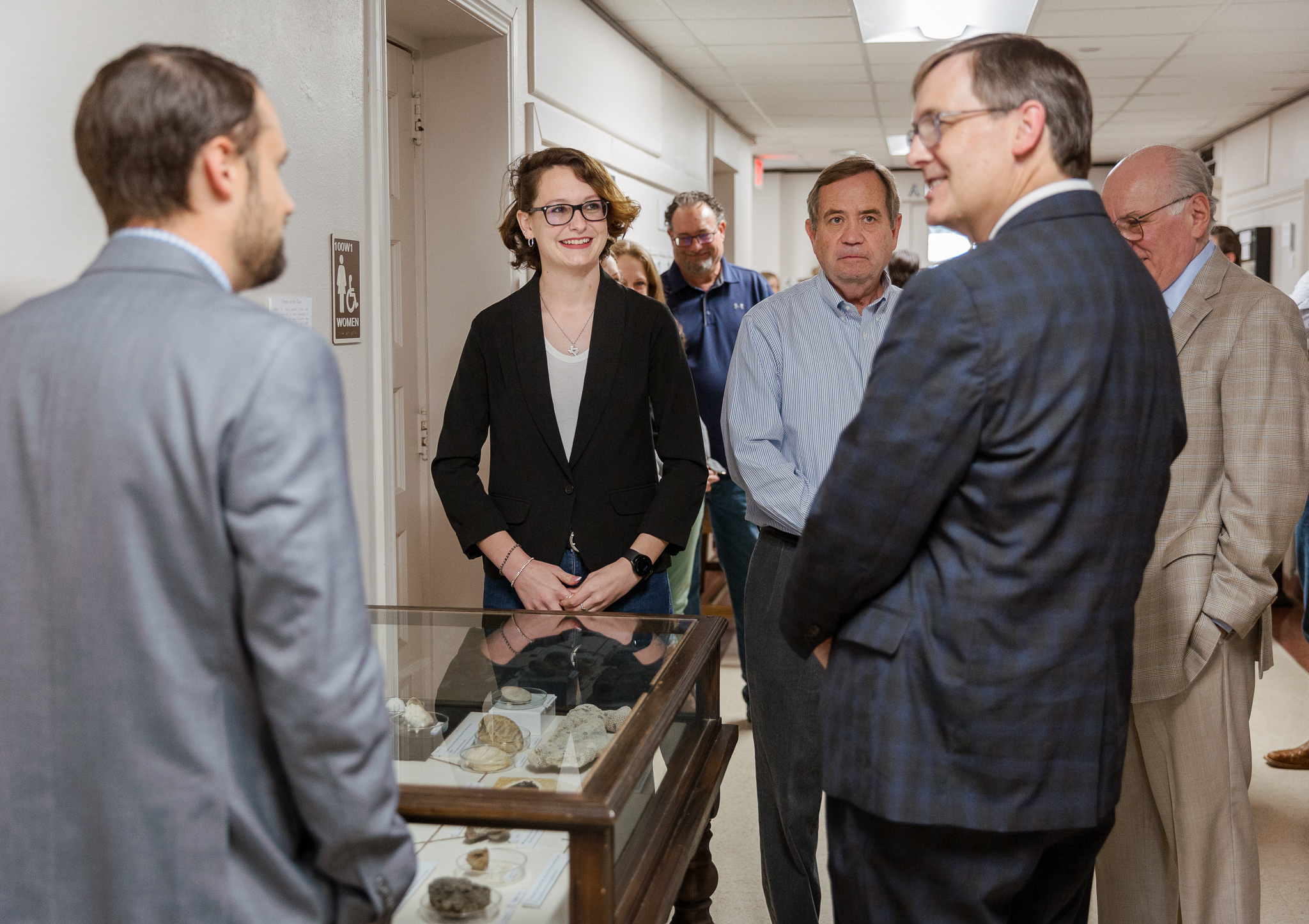 Student talks with community members