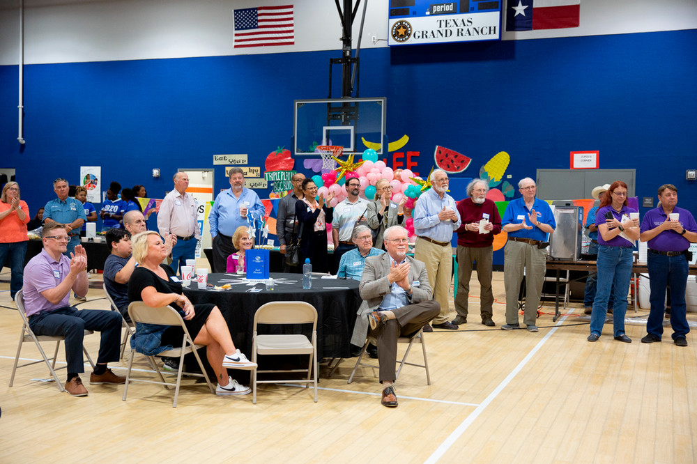 community members clapping