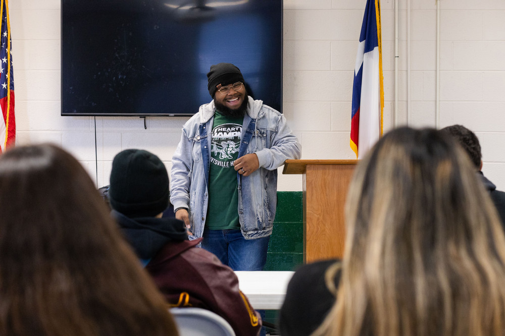 Community member presenting to students