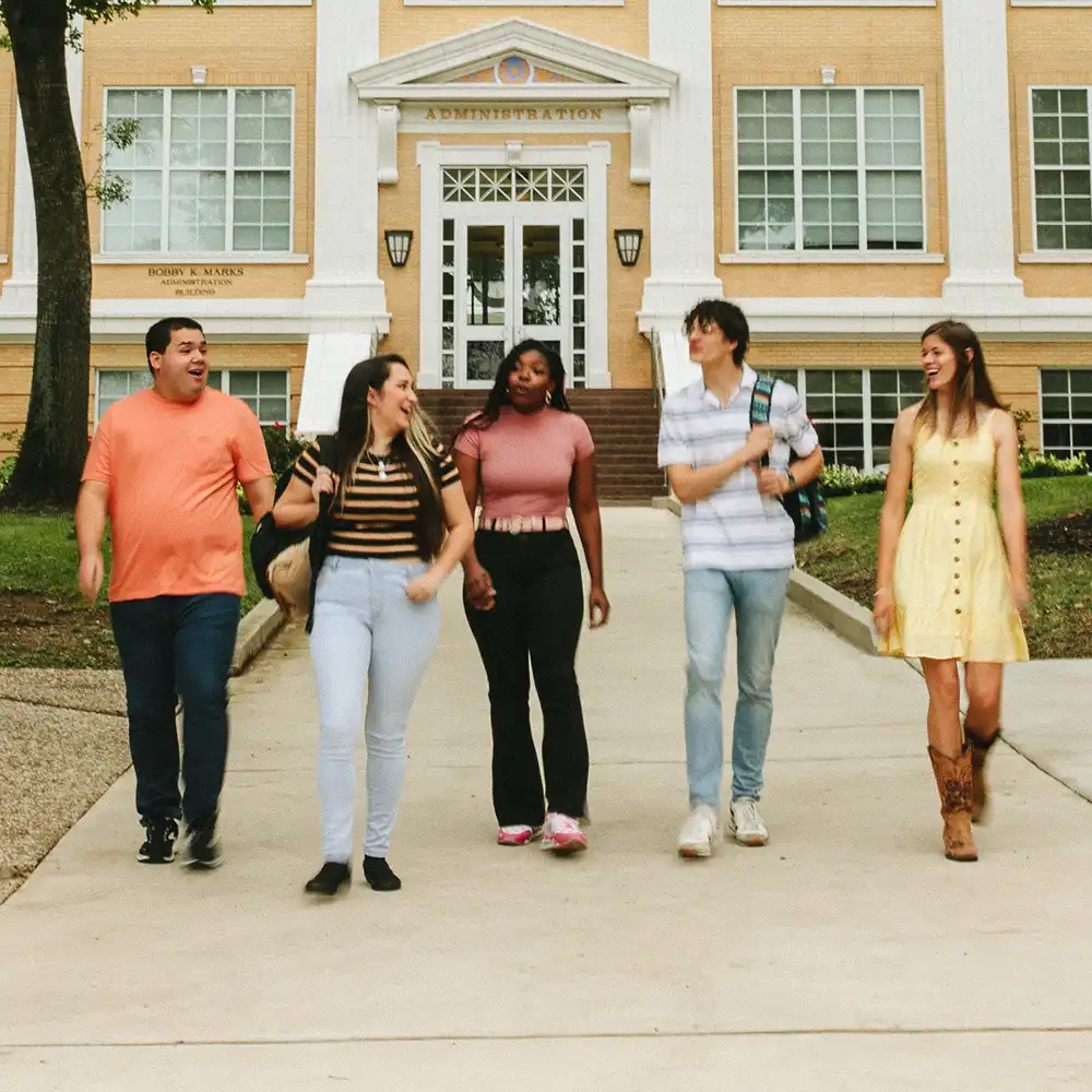 Student walking hand-in-hand