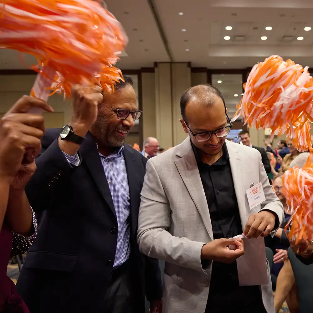 SHSU international student being celebrated by peers, faculty, and staff.