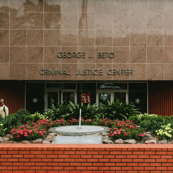 A photo of the front entrance of the SHSU George J Beto criminal Justice Center