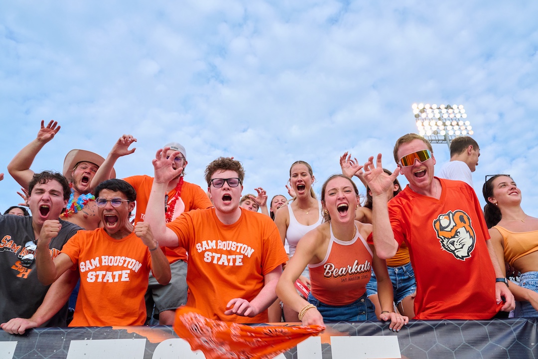 Students cheering on the SHSU football team