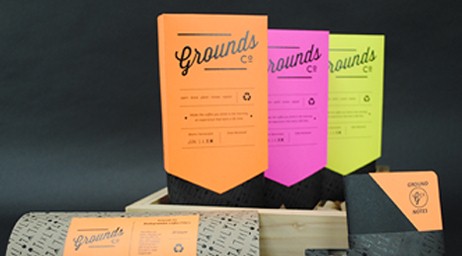 A group of brightly colored print materials showing what can be produced with a knowledge of graphic design.