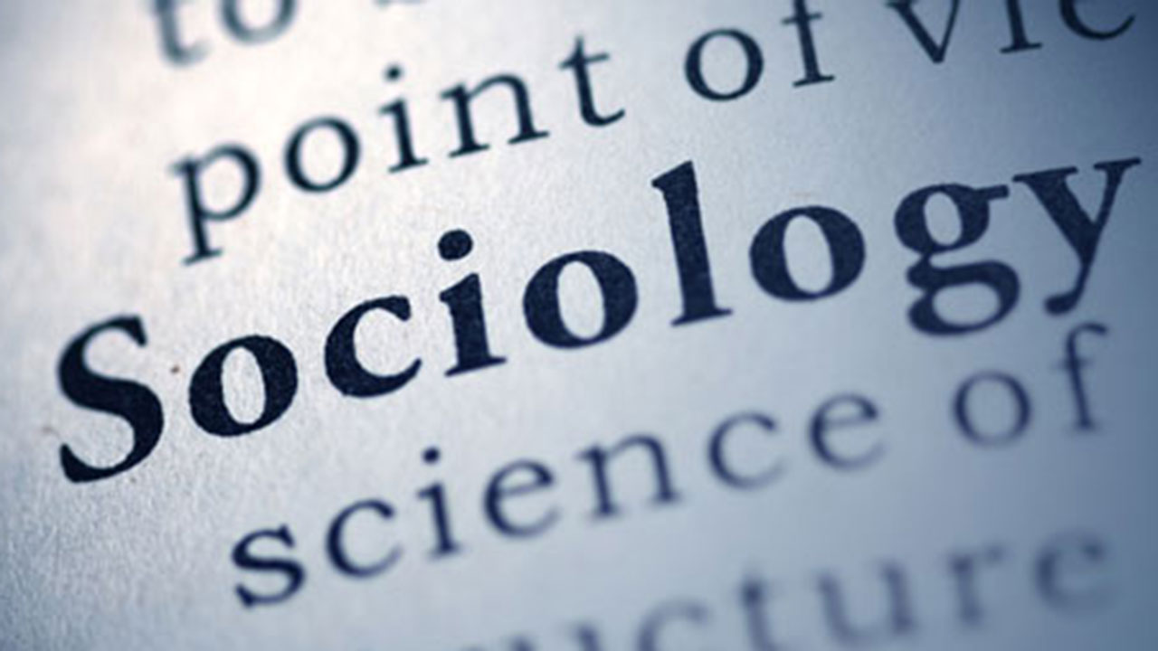 Zoomed in image of the word sociology in a book