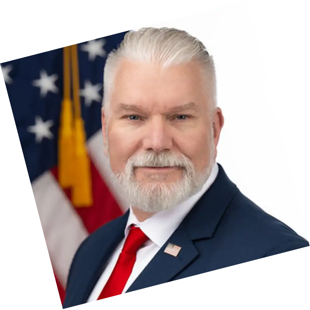 woman with a grey suit posing for a headshot