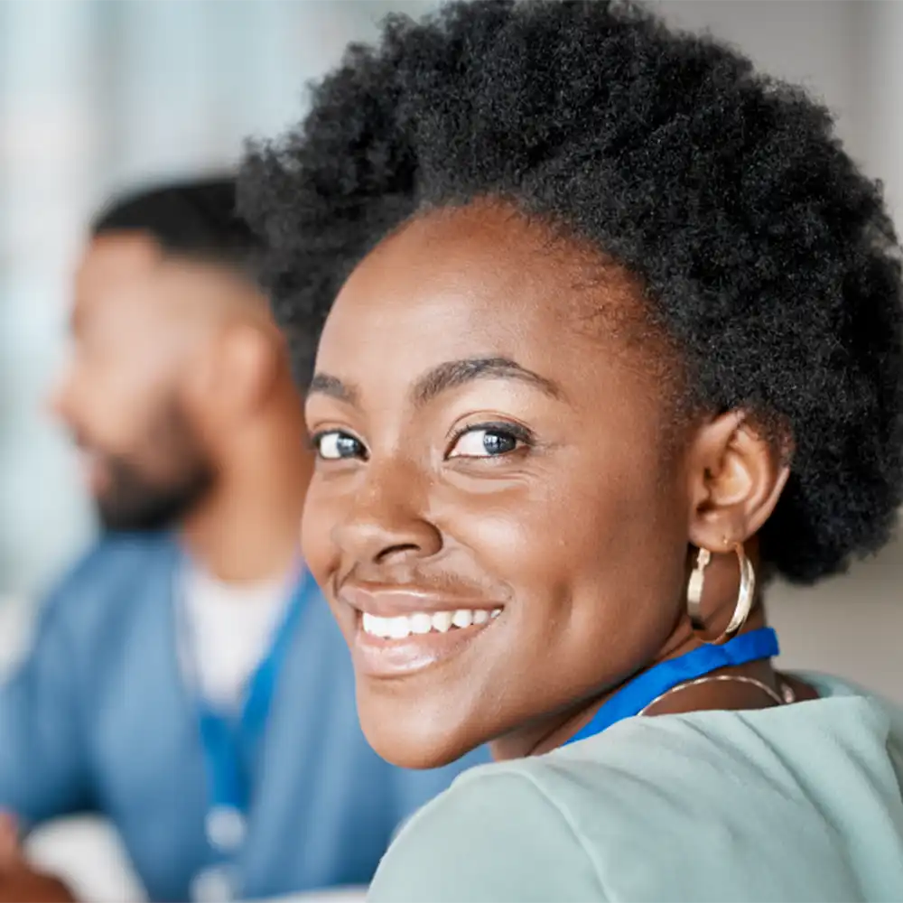 woman smiling towards camera