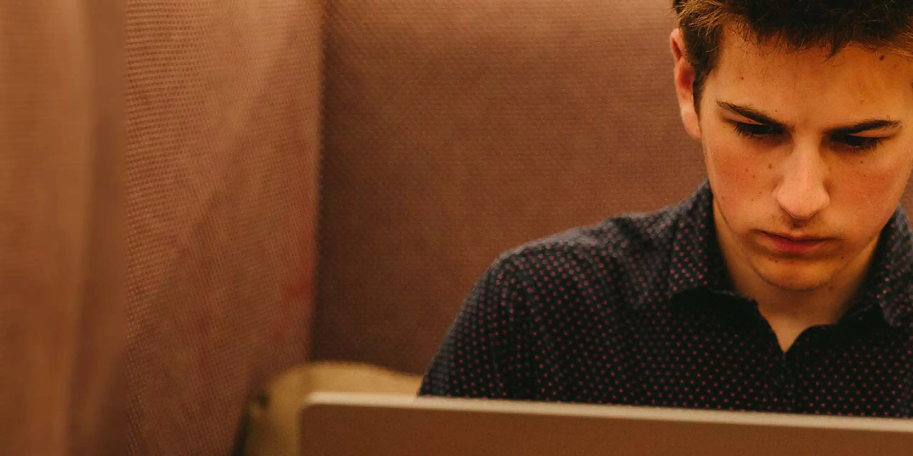 SHSU graduate student studying online for master’s degree at home with laptop