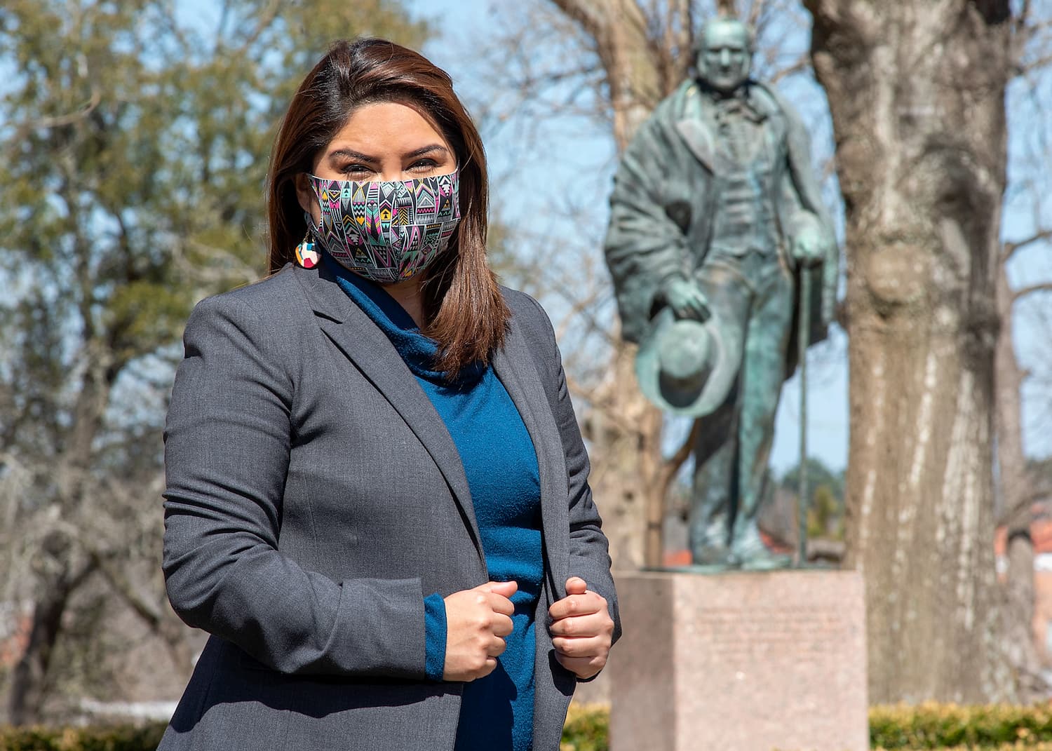 Fatima Hernandez looks professional as she stands outdoors on the SHSU campus.