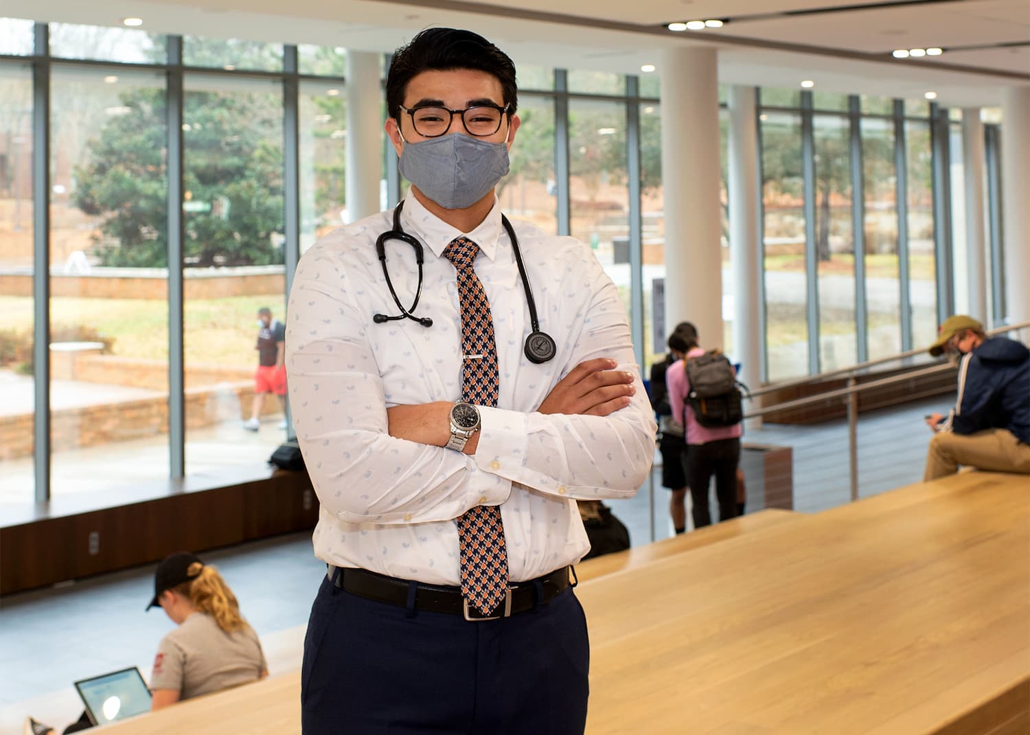 Jared Cruz stands in the newly renovated LSC with a stethoscope around his neck.