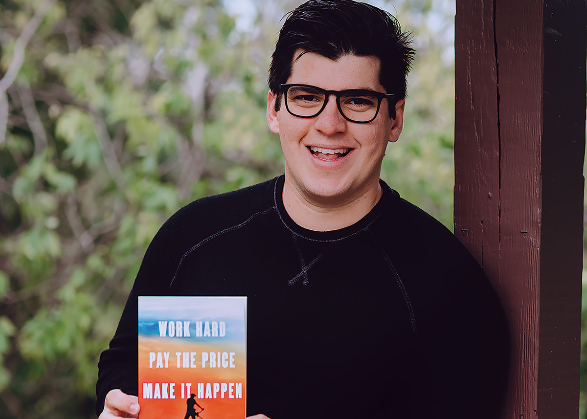 David Bond posing with his book.