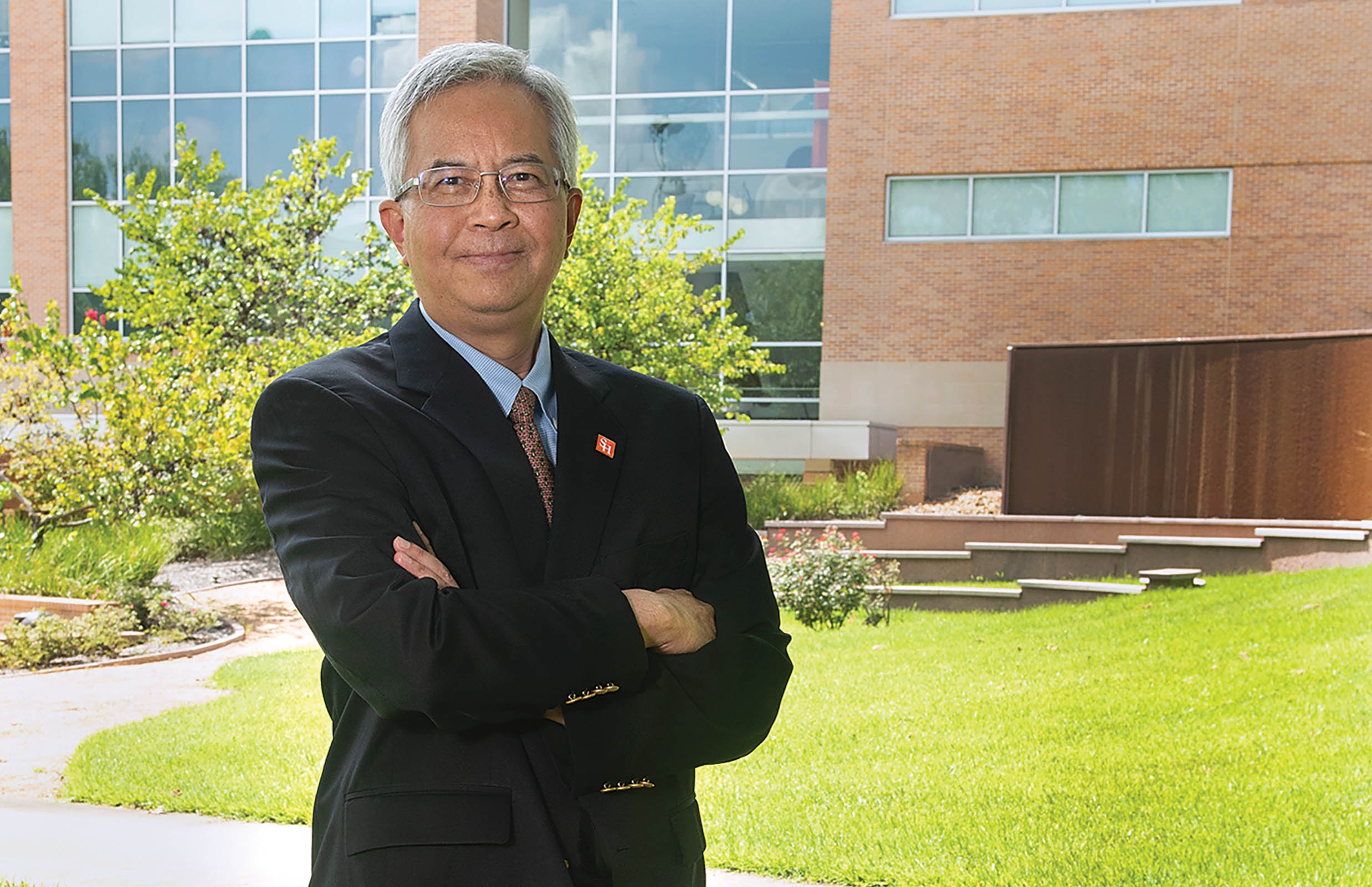 Dean Chien-Pin Li in front of CHSS building