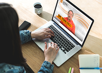 A student looks at health material online.