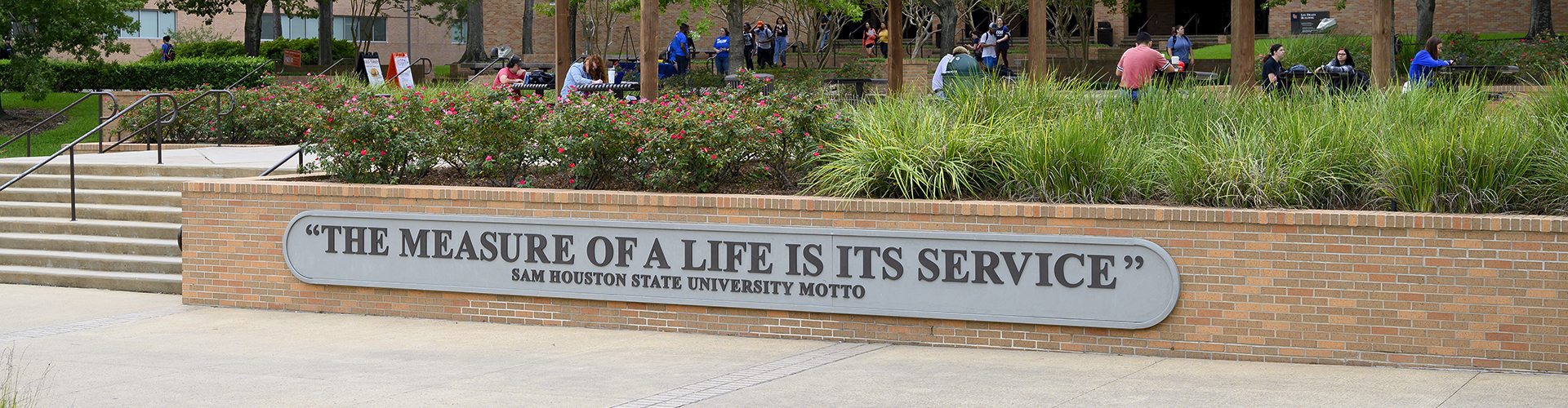 University Motto plaque in Bearkat Plaza