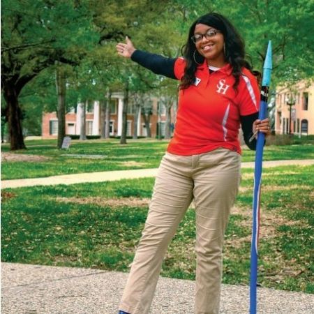 SHSU Tour Guide Posing on Campus