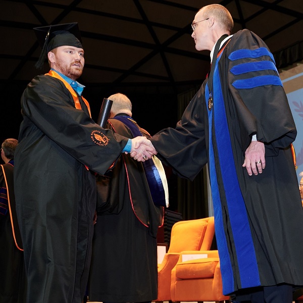 Colton crosses the stage