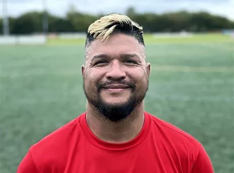 Photo of Robert Ferguson outside on a soccer field.