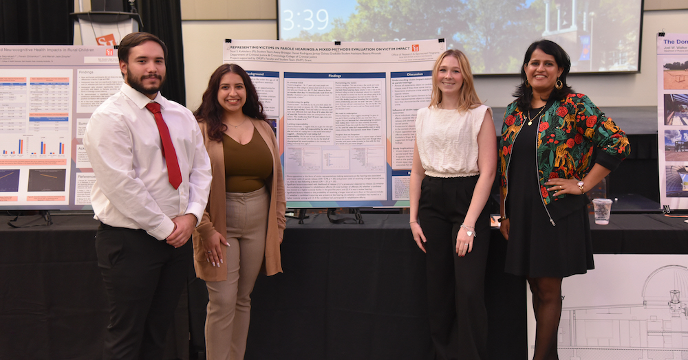 From left to right, Daniel Rodriguez, Jaritzy Ochoa, Avery Brinegar and Stuti Kokkalera, assistant professor of criminal justice and criminology. 