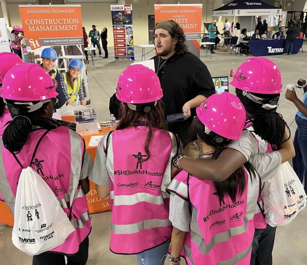 Lain Sowell speaks to a group from SHEbuildsHouston.