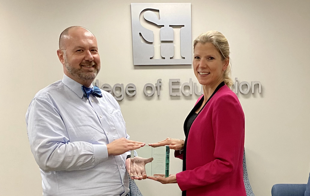 Dustin Hebert, associate dean of Accountability & Stacey Edmonson, dean of the College of Education